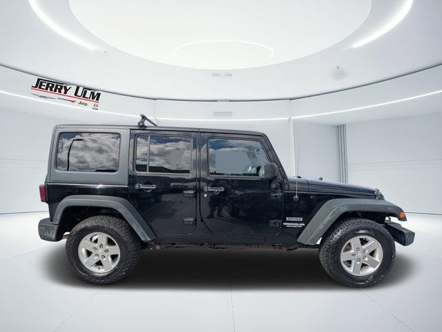 used 2013 Jeep Wrangler Unlimited car, priced at $10,988