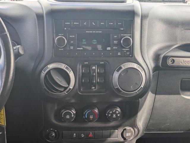 used 2013 Jeep Wrangler Unlimited car, priced at $10,988