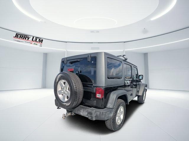 used 2013 Jeep Wrangler Unlimited car, priced at $10,988