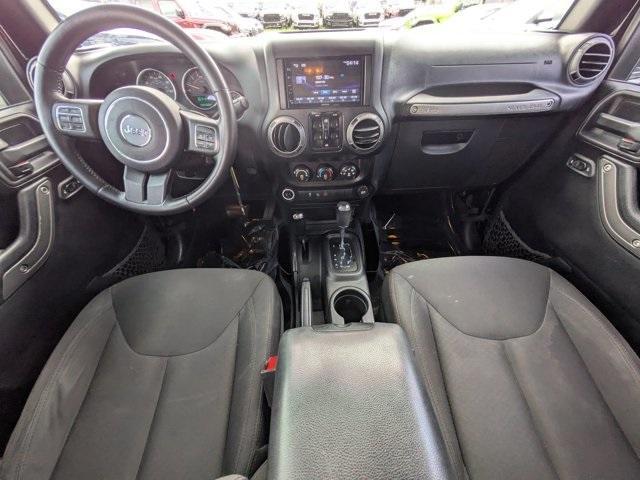 used 2016 Jeep Wrangler Unlimited car, priced at $13,868