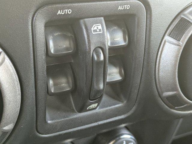 used 2015 Jeep Wrangler Unlimited car, priced at $19,213