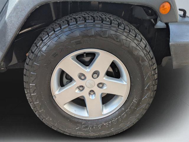 used 2015 Jeep Wrangler Unlimited car, priced at $19,213