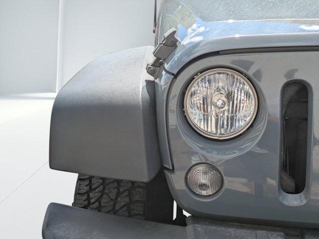 used 2015 Jeep Wrangler Unlimited car, priced at $19,213