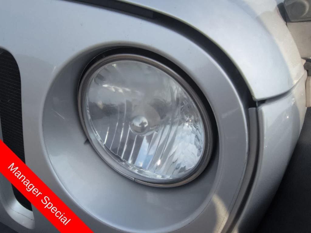 used 2010 Jeep Wrangler Unlimited car, priced at $10,991