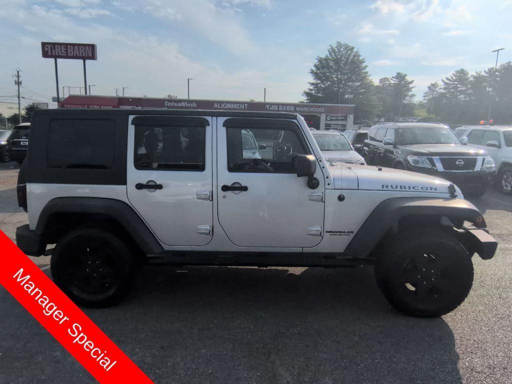 used 2010 Jeep Wrangler Unlimited car, priced at $10,991