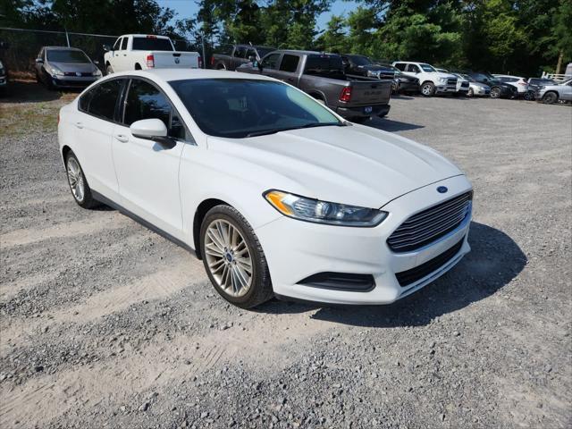 used 2015 Ford Fusion car, priced at $6,850