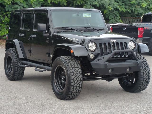 used 2017 Jeep Wrangler Unlimited car, priced at $21,630
