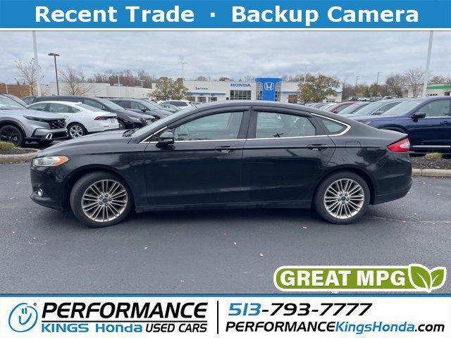 used 2014 Ford Fusion car, priced at $6,078