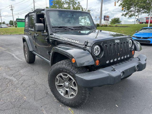 used 2013 Jeep Wrangler Unlimited car, priced at $22,314