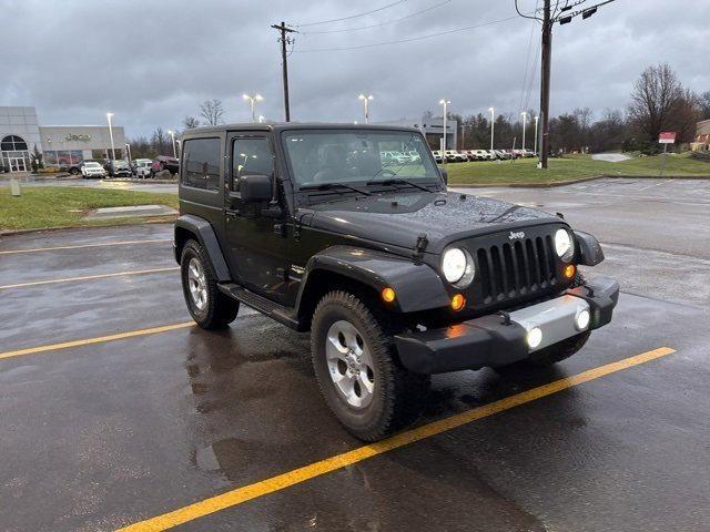 used 2014 Jeep Wrangler car, priced at $17,001