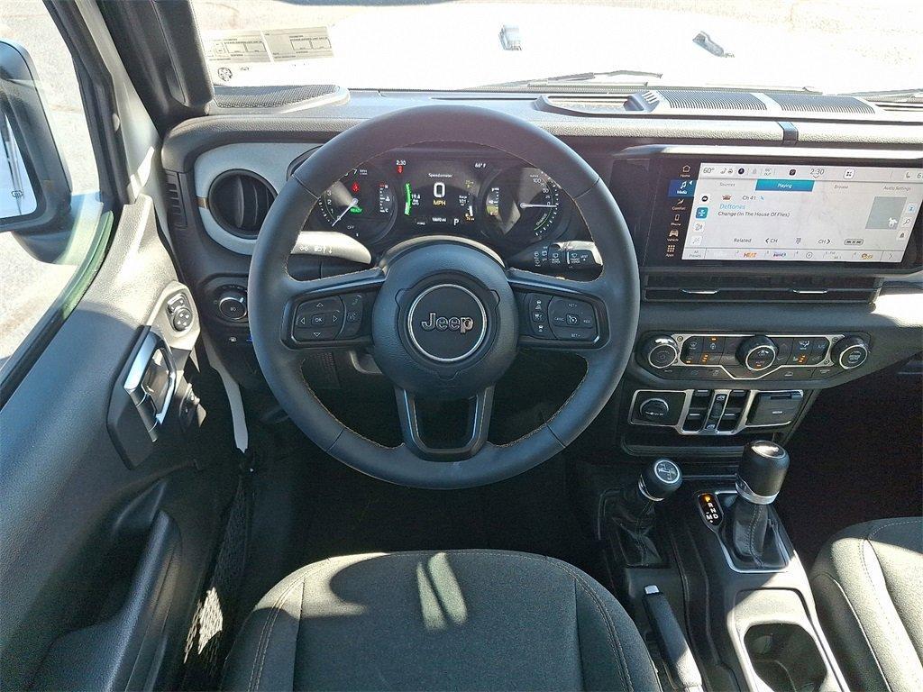 used 2024 Jeep Wrangler 4xe car, priced at $35,601
