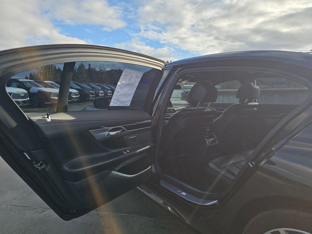 used 2022 BMW 750 car, priced at $49,491