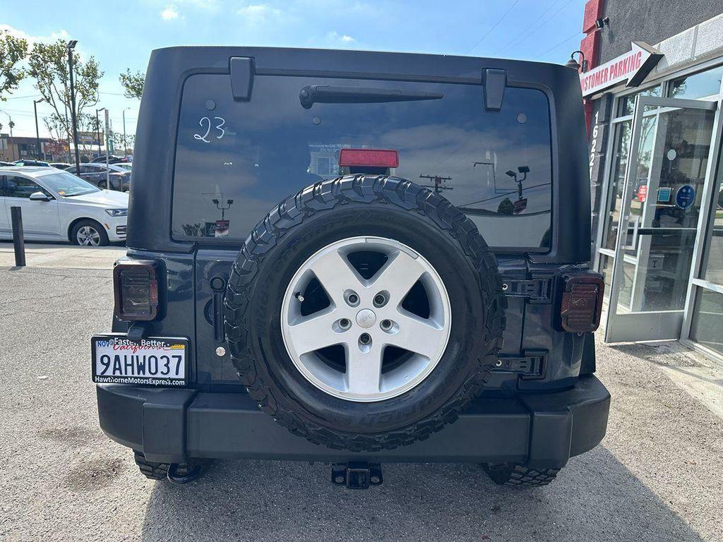 used 2018 Jeep Wrangler JK Unlimited car, priced at $19,900