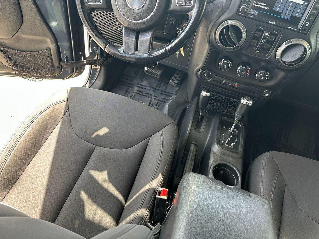 used 2018 Jeep Wrangler JK Unlimited car, priced at $19,900