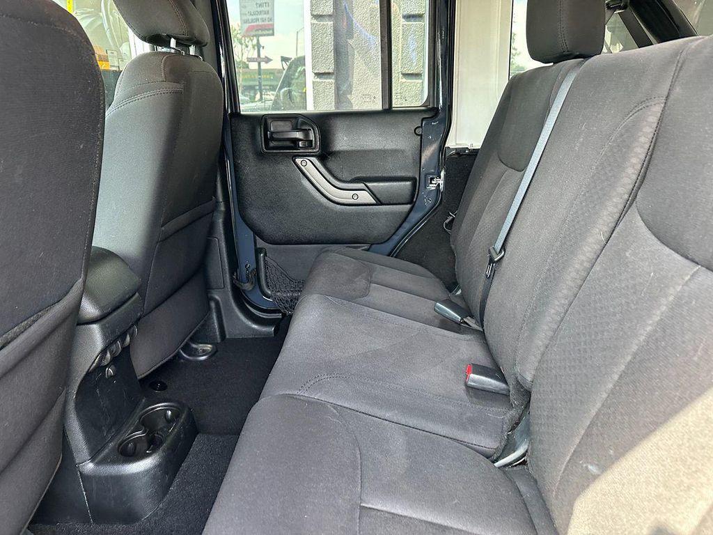 used 2018 Jeep Wrangler JK Unlimited car, priced at $19,900