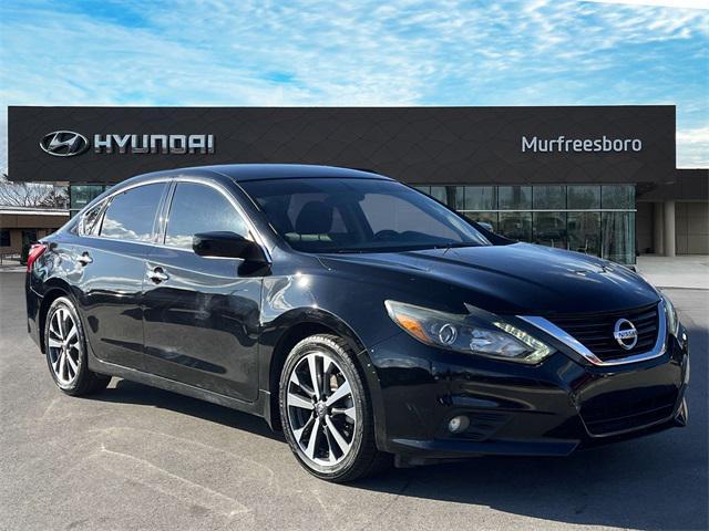 used 2016 Nissan Altima car, priced at $9,000