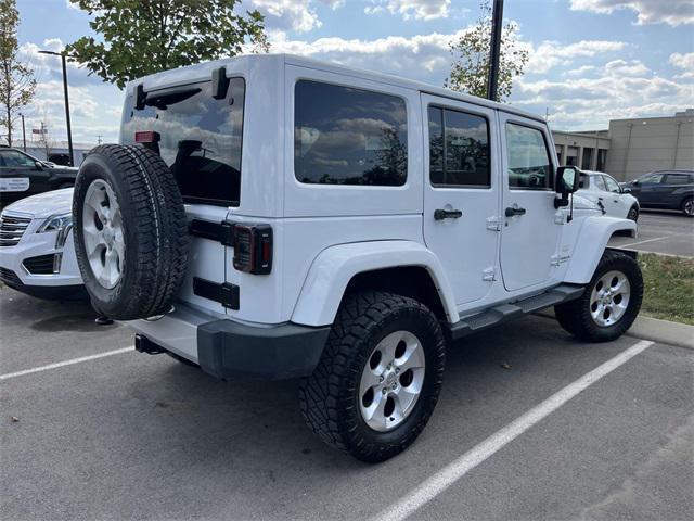used 2015 Jeep Wrangler Unlimited car, priced at $15,655