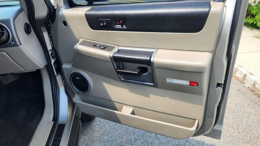 used 2003 Hummer H2 car, priced at $9,995