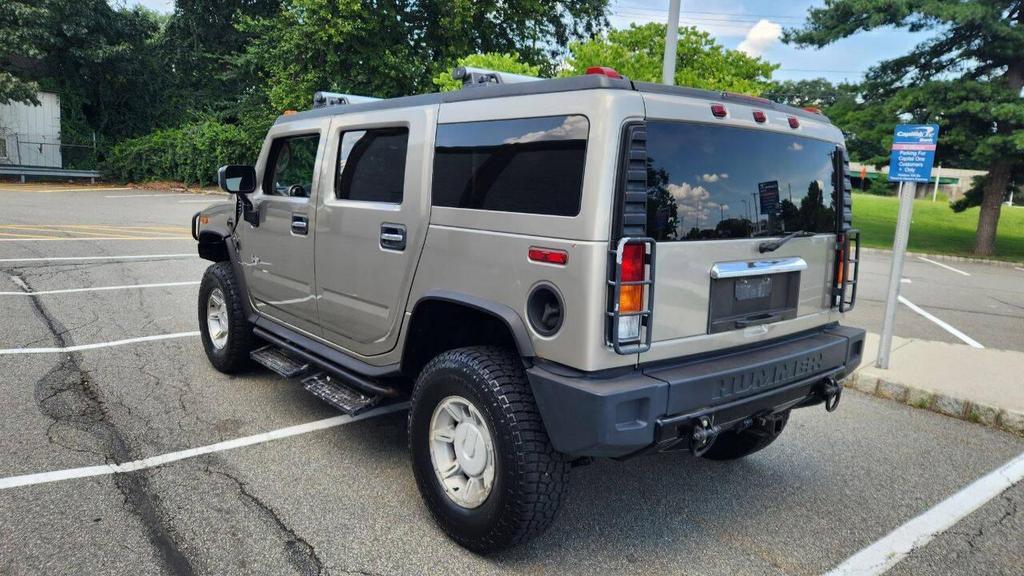 used 2003 Hummer H2 car, priced at $9,995