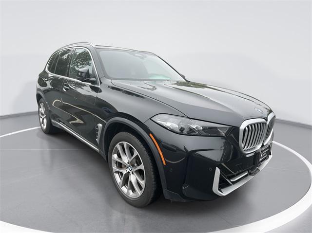 used 2024 BMW X5 car, priced at $63,714