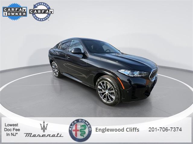 used 2024 BMW X6 car, priced at $63,427