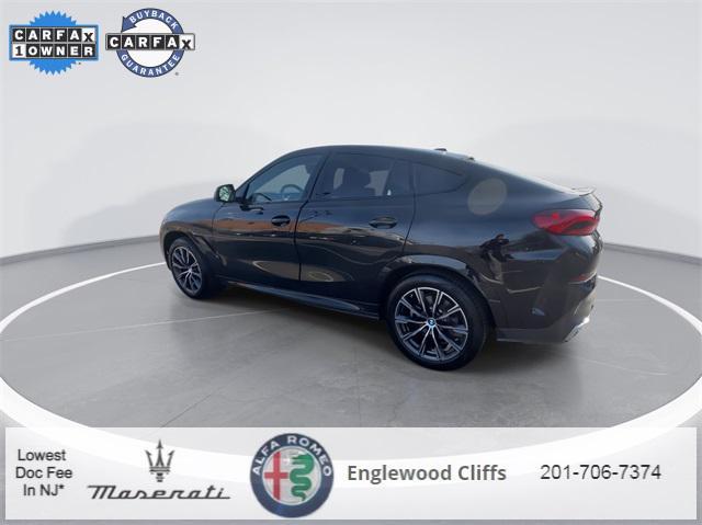 used 2024 BMW X6 car, priced at $63,427