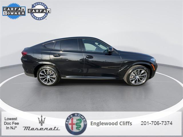 used 2024 BMW X6 car, priced at $63,427