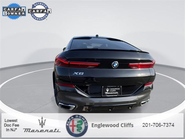 used 2024 BMW X6 car, priced at $63,427