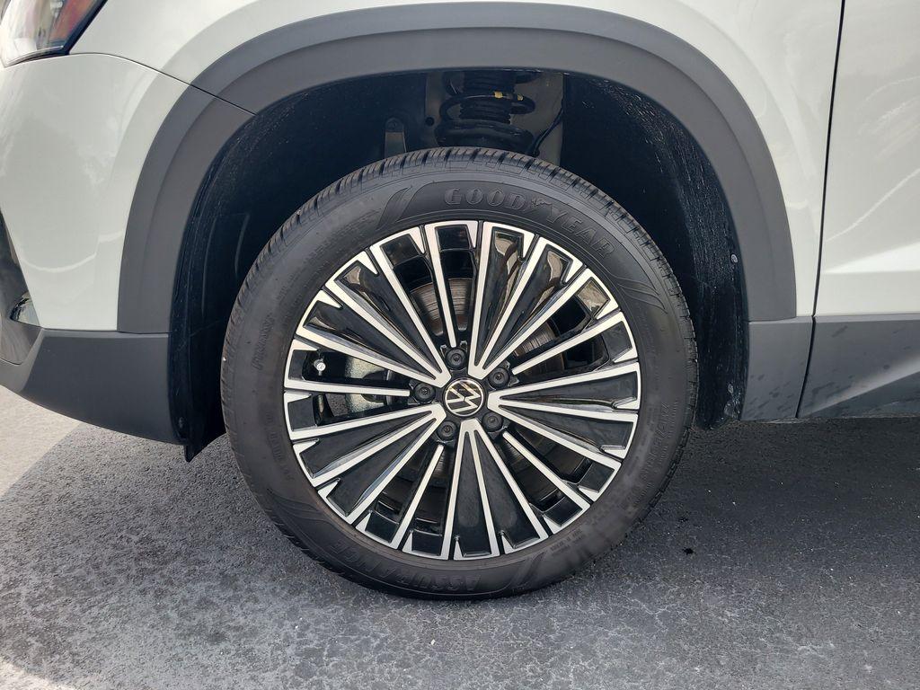 used 2025 Volkswagen Taos car, priced at $28,036
