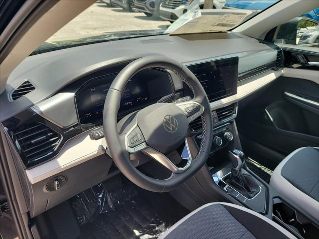 new 2025 Volkswagen Taos car, priced at $26,418