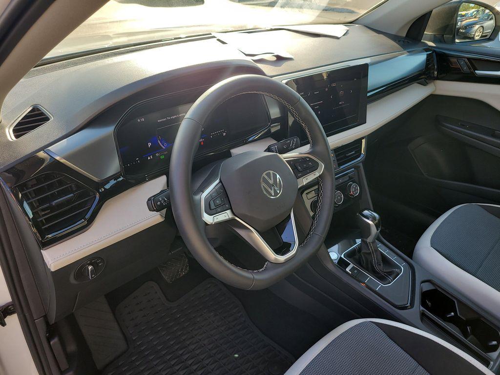 used 2025 Volkswagen Taos car, priced at $23,000