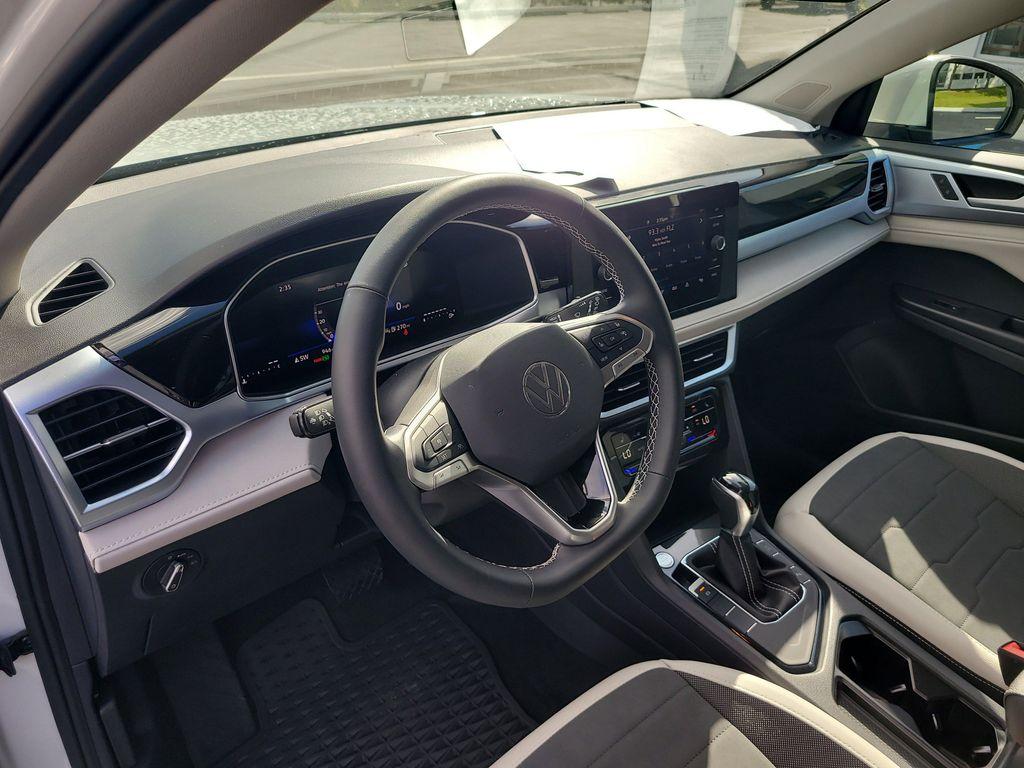 used 2025 Volkswagen Taos car, priced at $27,800