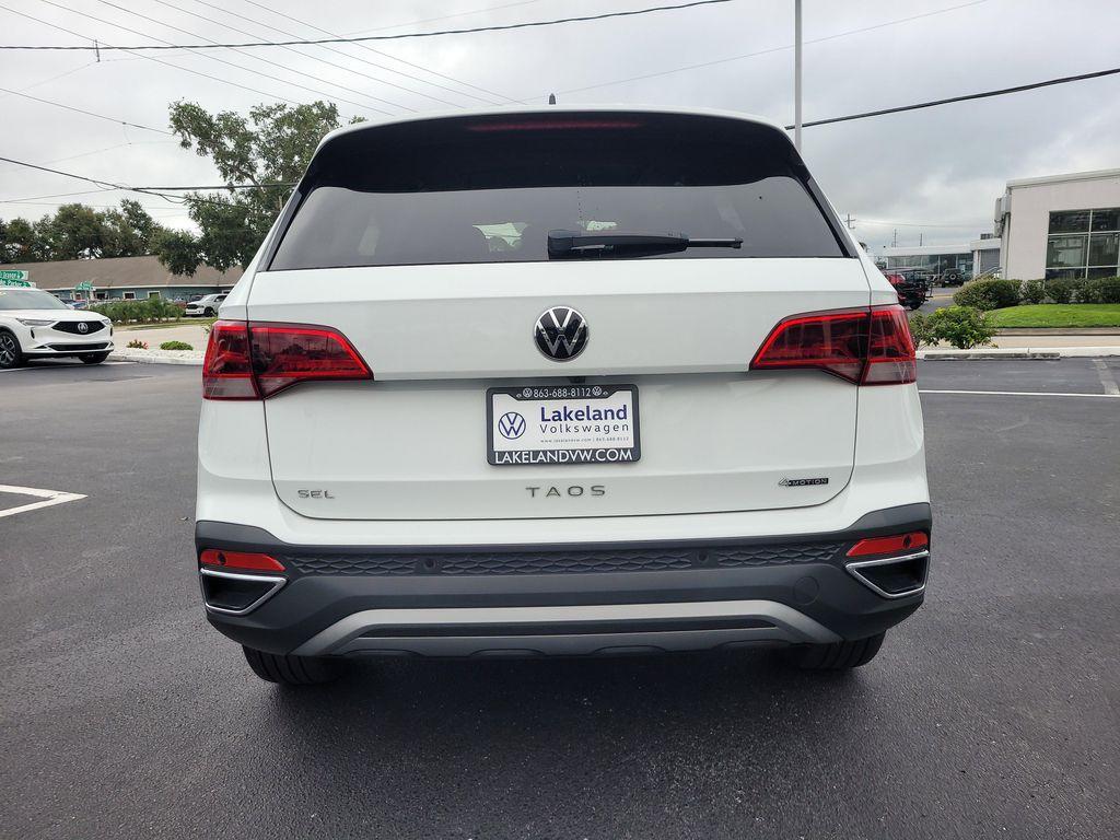 used 2024 Volkswagen Taos car, priced at $29,514