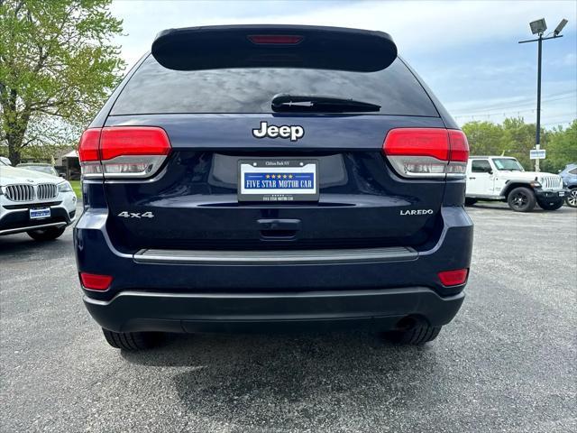 used 2014 Jeep Grand Cherokee car, priced at $12,997