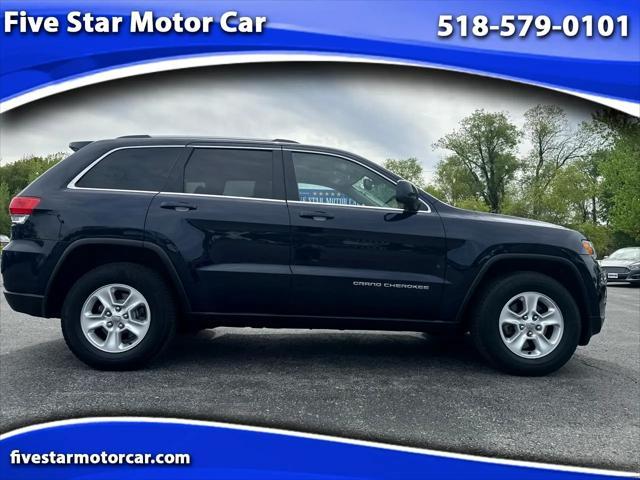 used 2014 Jeep Grand Cherokee car, priced at $12,997
