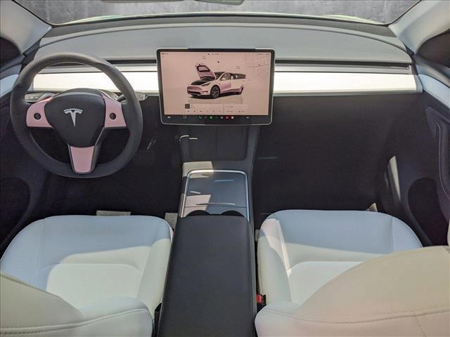 used 2025 Tesla Model Y car, priced at $36,981