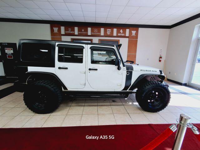 used 2014 Jeep Wrangler Unlimited car, priced at $23,000