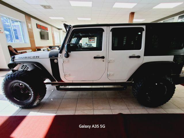 used 2014 Jeep Wrangler Unlimited car, priced at $23,000