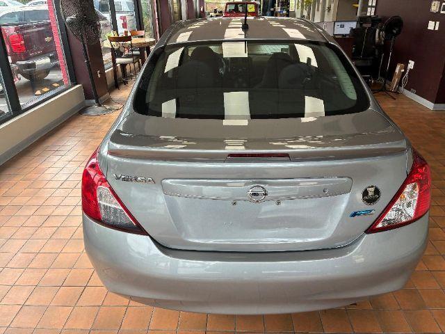 used 2013 Nissan Versa car, priced at $6,500
