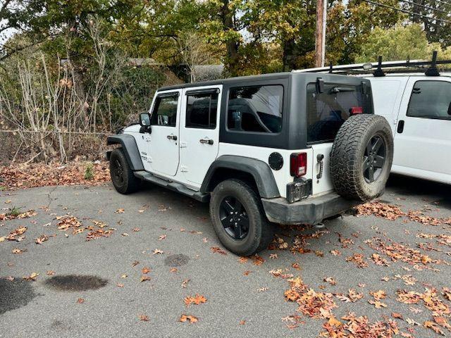 used 2013 Jeep Wrangler Unlimited car, priced at $15,400