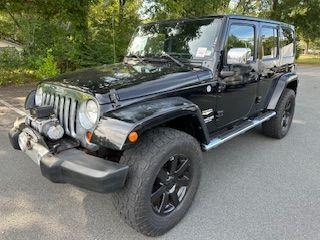 used 2013 Jeep Wrangler Unlimited car, priced at $18,100