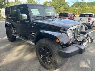 used 2013 Jeep Wrangler Unlimited car, priced at $18,100