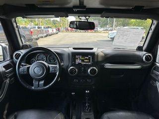 used 2013 Jeep Wrangler Unlimited car, priced at $18,100