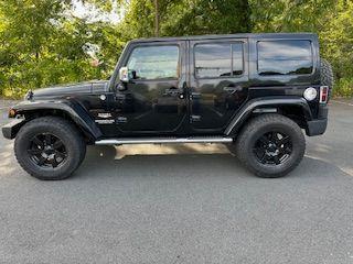 used 2013 Jeep Wrangler Unlimited car, priced at $18,100