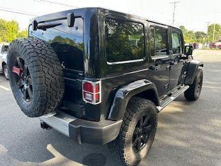 used 2013 Jeep Wrangler Unlimited car, priced at $18,100