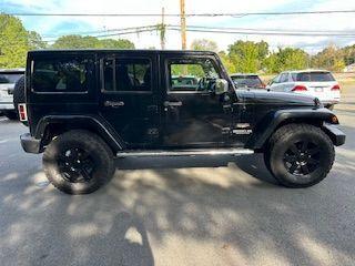 used 2013 Jeep Wrangler Unlimited car, priced at $18,100