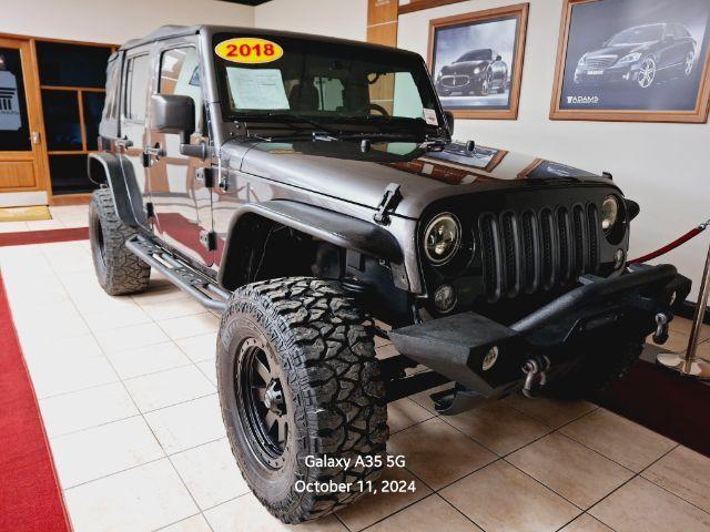 used 2018 Jeep Wrangler JK Unlimited car, priced at $19,200