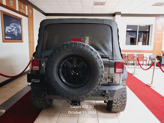 used 2018 Jeep Wrangler JK Unlimited car, priced at $19,200