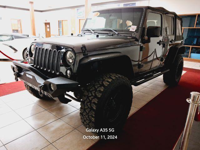 used 2018 Jeep Wrangler JK Unlimited car, priced at $19,200