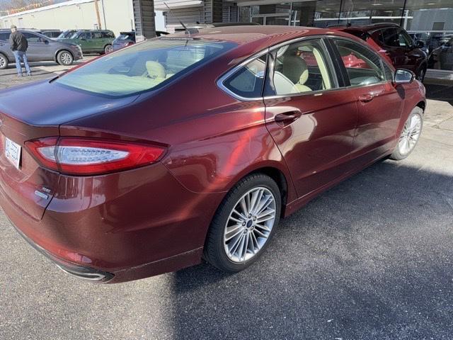 used 2014 Ford Fusion car, priced at $10,000